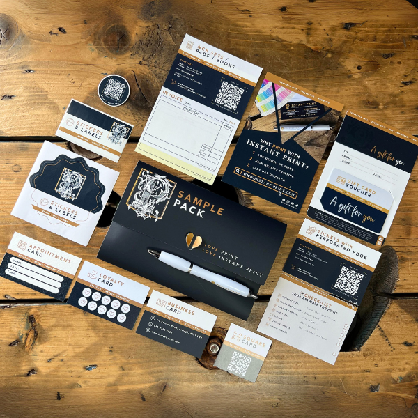 Instant Print business sample pack with everything laid out